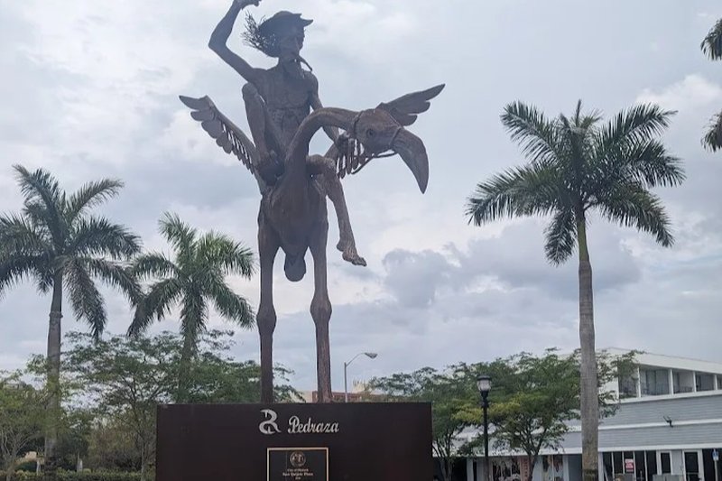 Exceptional photo of Don Quijote Plaza Castle Estates, Hialeah, FL 33012 Statue and landscaped area in a public square Castle Estates, Hialeah, FL 33012